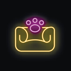 Neon sign of a dog bed with a paw print glowing on a black background