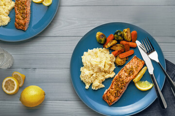 Healthy Salmon Dinner Plate with Mashed Potatoes and Lemon