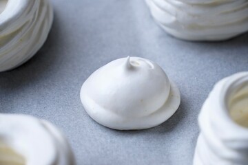 Close-Up of Unbaked Meringue on Baking Sheet