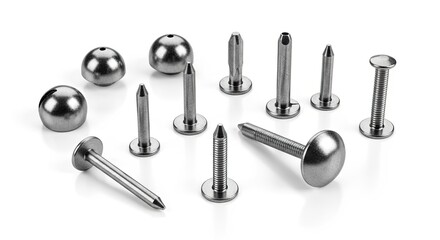 Assorted metal fasteners on white background.