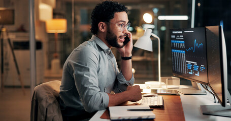 Evening, phone call or man with computer screen, trading or investment account with communication. Person, night or stock market analysis with pc, cellphone or stats for profit increase or discussion