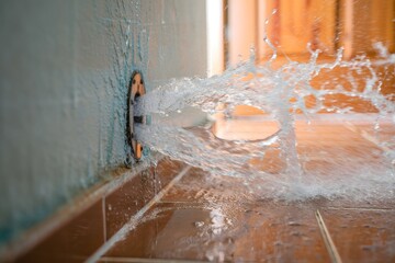 Burst Pipe Spraying Water - Plumbing Emergency
