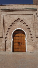 Fototapeta premium Traditional Moroccan Wooden Door with Archway