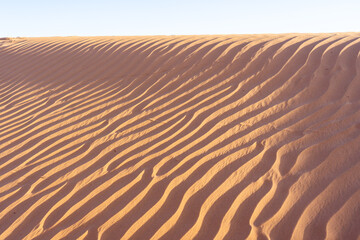 Sands wave texture of desert sand dunes.