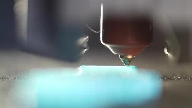 3D printer creating a plastic model layer by layer during detailed printing. High quality 4k footage