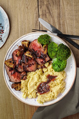 Overhead View of Steak, Mashed Potatoes, and Broccoli Dinner