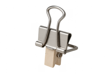 Metal bulldog clip holding wood block transparent background