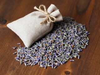 DIY Lavender Sachet Bag on Dried Flowers Pile Close Up
