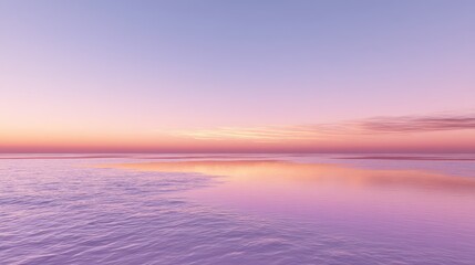 Serene Sunset Over Calm Water with Beautiful Pink and Purple Sky Reflections at Dusk