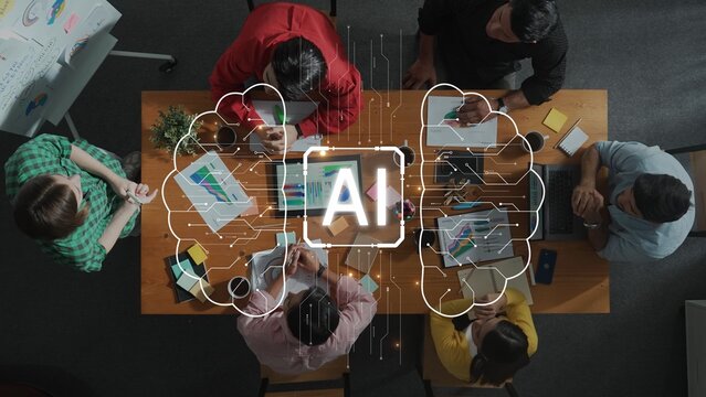 A diverse team engaging in a collaborative meeting, utilizing artificial intelligence concepts while discussing strategies, ideas, and visual charts in a modern workspace. Raster - Powered by Adobe
