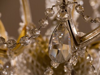 old historical crystal ceiling light in a palace