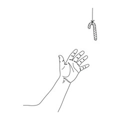 Human Hand Reaching for Delicious Christmas Candy Cane Treat During the Holiday Season