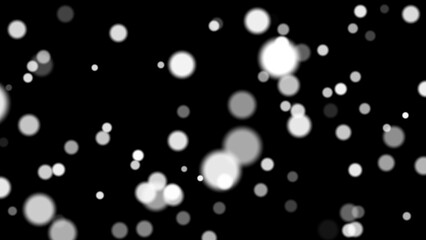 Beautiful festive bokeh effect, blue circles of light shining falling falling glowing christmas new year on black background. Abstract background