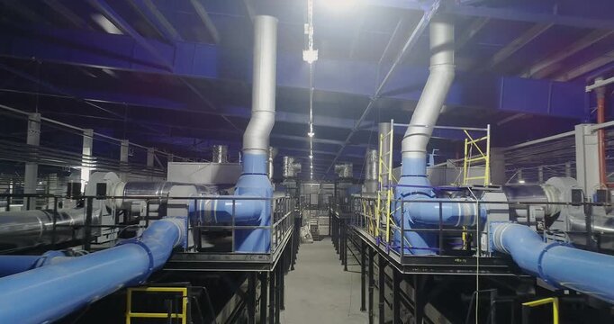 Ceramic Tile Roller Kiln. A production line or conveyor at a ceramic and porcelain tile factory. Firing. Ceramic Tile Making.  Manufacturing process of ceramic tiles. Industrial kiln. Indoors