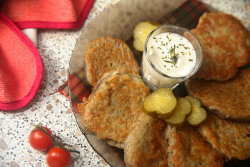 Breakfast with potatoes pancakes draniki and vegetables