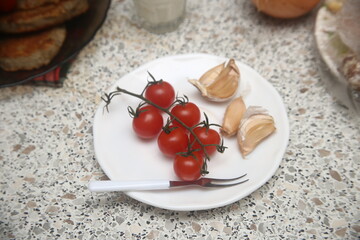 cherry tomatoes on a wooden board