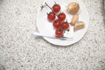 cherry tomatoes on a plate