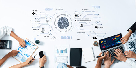 A modern workspace scene showcasing a diverse team discussing data management strategies, with...
