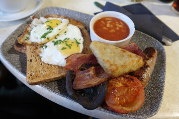 A Plate full of a traditional English Breakfast