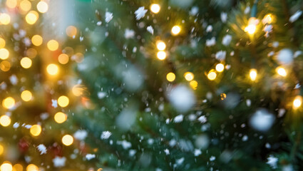 Soft snowflakes falling in front of blurred warm Christmas lights and deep green pine branches, creating a dreamy, glowing winter holiday atmosphere filled with motion and sparkle