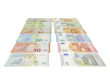 Two piles of assorted euro banknotes from one hundred to five euros arranged in neat parallel rows, isolated on a plain white background in a tilted studio view.
