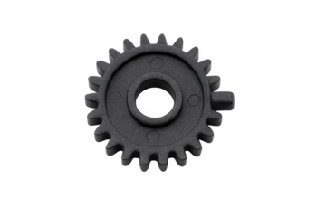 Black plastic gear cog mechanism component on transparent background