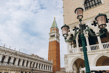 Fototapeta premium St. Mark's Campanile towering over Piazza San Marco Venice