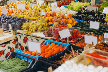 Farmers market stall displaying fresh organic fruit and vegetables