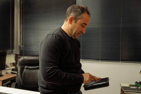 Man using tablet in modern office