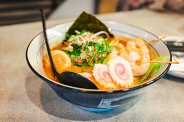 Japanese ramen soup with shrimps, egg, chives and sprout