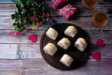 Cream cheese dill ham pinwheel on a plate for Valentine's day holidays