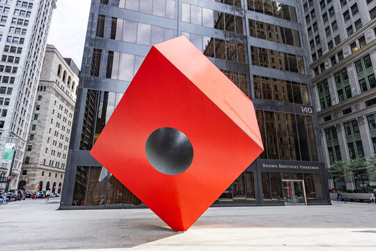 New-York, USA - 23.11.2025: The Red Cube in Manhattan's Financial District, New York City. Red Cube by Isamu Noguchi.