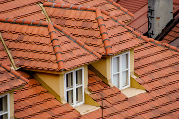 Close-up view of a roof with dormer windows.