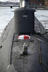 Fototapeta premium Russian Submarine in the Hamburg Port. Old russian submarine with seagulls at the Hamburg Harbor. Landungsbrücken.