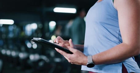 Tablet, fitness and hands of woman in gym with research for workout routine with wellness. Health, digital technology and female person scrolling on app for exercise or training in sports center. - Powered by Adobe