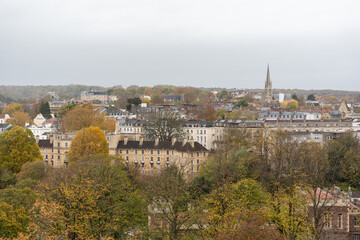 Autumn cityscape with cloudy sky