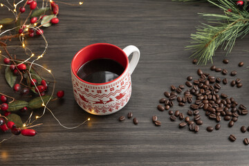 Festive mug of coffee on a dark wood background with a Christmas border
