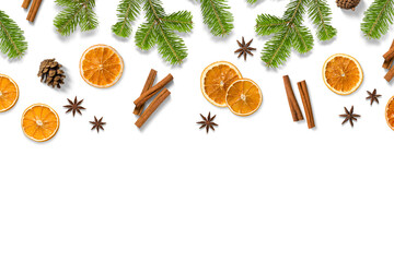 Christmas composition with green fir branches, dried orange slices, cinnamon sticks, anise and pine...