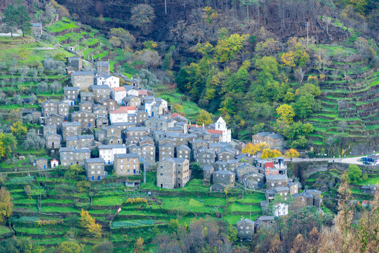 Piodao historic schist village on slope of Serra do Acor mountains in central Portugal. Medium shot