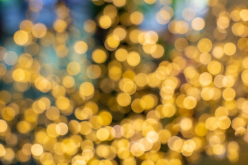Obraz premium Golden bokeh lights creating festive holiday background