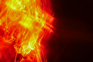 Fototapeta premium Abstract fire glowing motion background red orange