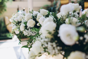 White roses floral arrangement for elegant celebration events