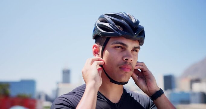 Cycling, athlete and fasten helmet in city for bicycle safety, triathlon exercise and cardio fitness. Cyclist, man and headgear preparation for ride protection, getting ready and sports performance