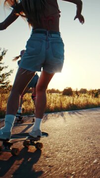 Friends radiate joy as ride surfskates along empty rural road