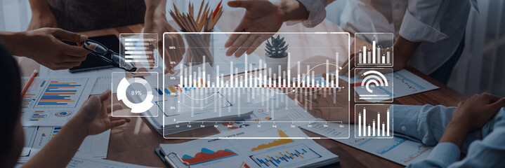 A dynamic business meeting in a modern office, showcasing hands discussing data visualization and charts. Perfect for illustrating teamwork and decision-making. Trope