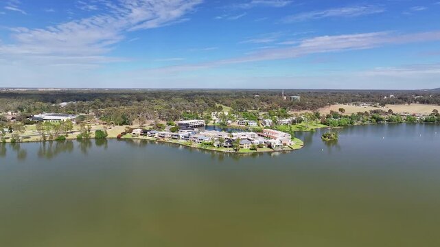 Peninsula homes bordered by forest and Lake Mulwala