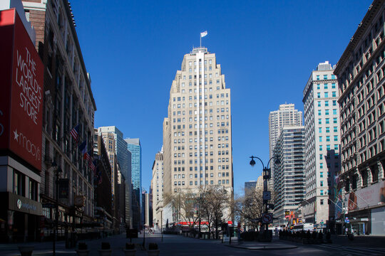 Macys megastore at Herald Square town square and the historic skyscraper Buildings of Midtown Manhattan, New York City, USA