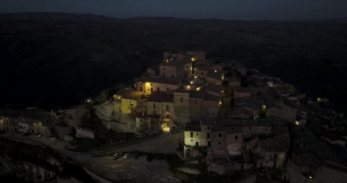 Aerial view of Calitri at night, Italy.
