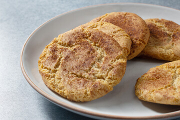 A view of a plate of gluten-free, dairy-free snickerdoodle cookies.