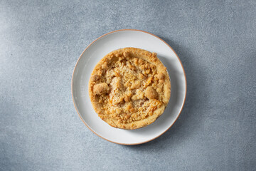 A top down view of a gluten-free, dairy-free mini southern peach pie.